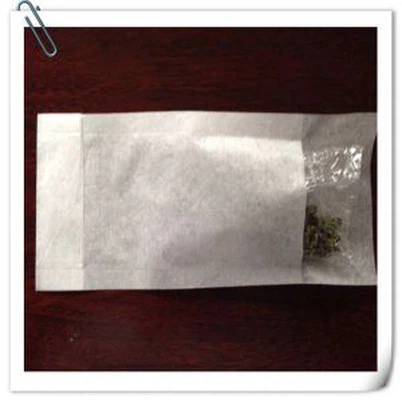 чайний мішок з язиком і паличкою